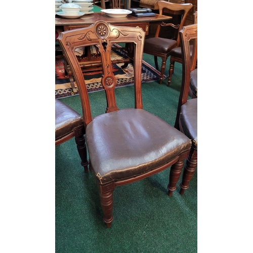 138 - A LOVELY SET OF FOUR VICTORIAN DINING CHAIRS, each with carved back rests with a central back splat ... 