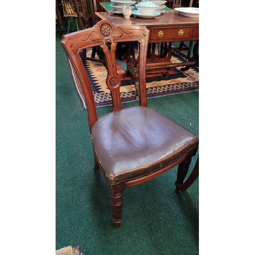 138 - A LOVELY SET OF FOUR VICTORIAN DINING CHAIRS, each with carved back rests with a central back splat ... 