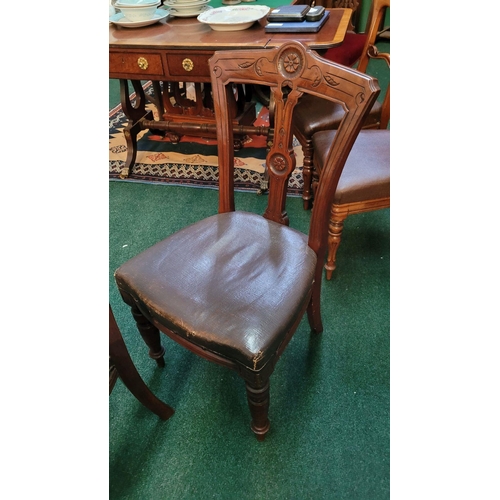 138 - A LOVELY SET OF FOUR VICTORIAN DINING CHAIRS, each with carved back rests with a central back splat ... 