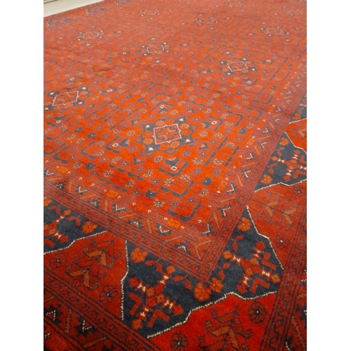 141 - AN AUTHENTIC AFGHAN KHAN MOHAMMADI RUG, hand-woven in the traditional Khan Mohammadi pattern in vibr... 