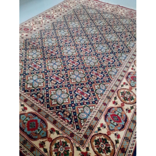 144 - A HAND-KNOTTED AFGHAN KUNDUZ RUG, with central repeat geometric pattern surrounded by multiple borde... 