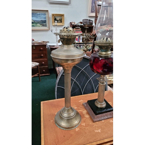 149 - A MIXED BRASS LAMP LOT: includes; (i) TWO VICTORIAN BRASS COLUMN OIL LAMPS, (i) with a cast metal ga... 