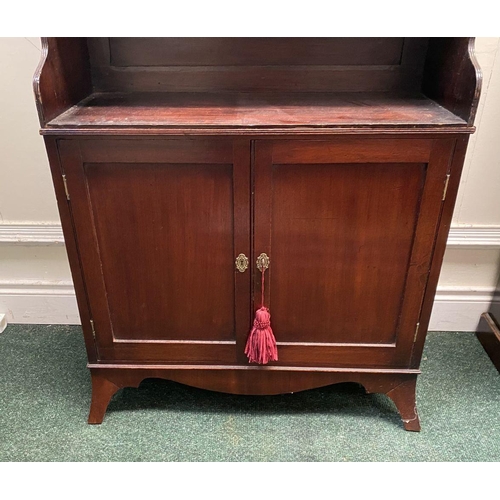 15 - A FINE GEORGE III MAHOGANY WATERFALL BOOKCASE CABINET, with three cascading open shelves, enclosed b... 