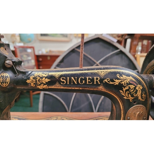 152 - A 19TH CENTURY HAND-CRANK FIDDLE-BASE SINGER SEWING MACHINE, a beautiful piece of antique machinery;... 