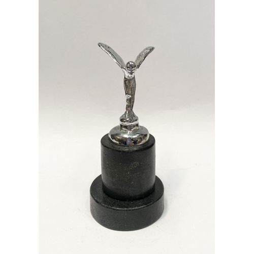 154 - A ROLLS ROYCE SPIRIT OF ECSTACY PAPERWEIGHT, on heavy circular platform base. Dimensions: 12.5cm hig... 