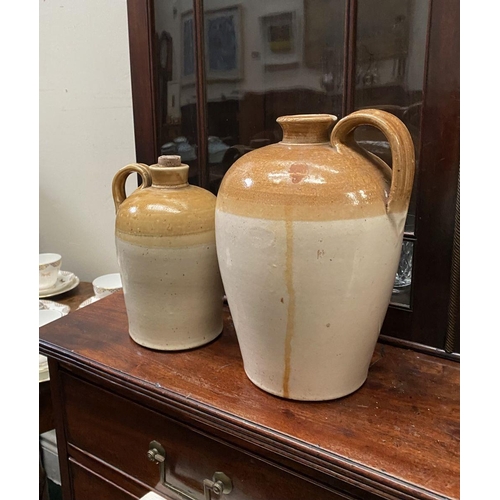 182 - TWO VINTAGE STONEWARE FLAGONS, one by Port Dundas Potteries Glasgow, both of traditional form with b... 