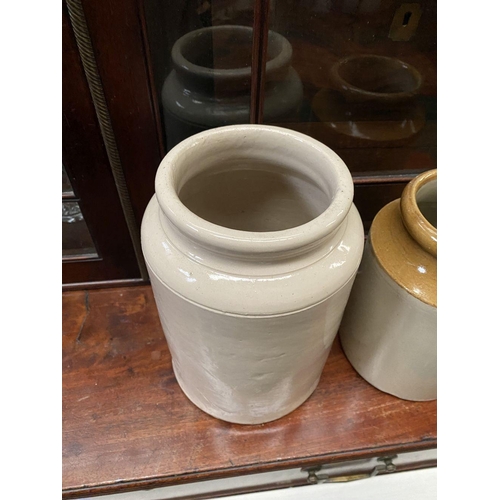 183 - TWO VINTAGE STONEWARE JARS, traditional design one with brown glaze to neck. Dimensions: larger: 21.... 