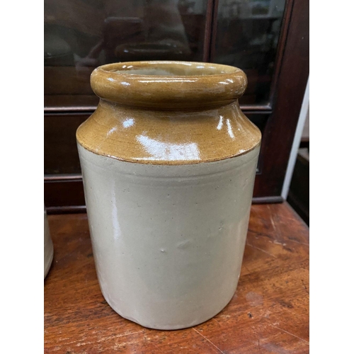 183 - TWO VINTAGE STONEWARE JARS, traditional design one with brown glaze to neck. Dimensions: larger: 21.... 