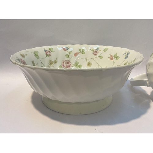 185 - A WEDGWOOD BONE CHINA JUG AND BOWL IN THE ROSEHIP PATTERN, both marked to base, in good condition. D... 