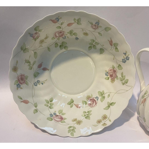 185 - A WEDGWOOD BONE CHINA JUG AND BOWL IN THE ROSEHIP PATTERN, both marked to base, in good condition. D... 