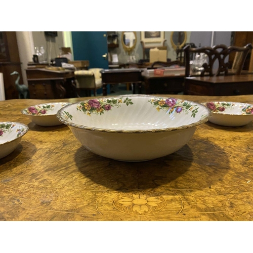 186 - A COLLECTION OF IRONSTONE POTTERY BOWLS IN THE ENGLISH ROSE PATTERN, to include one large bowl and s... 