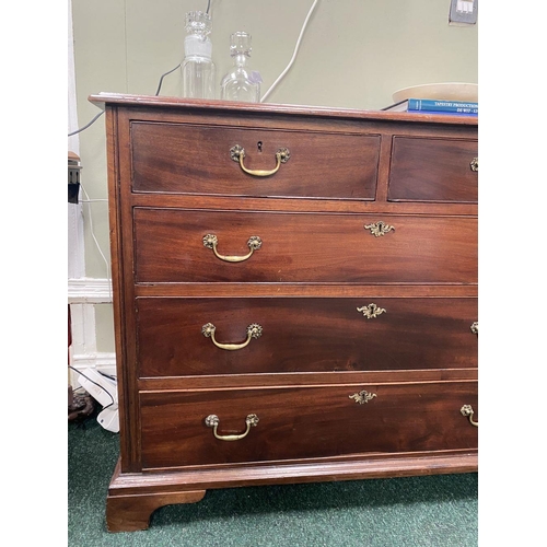 19 - AN ATTRACTIVE NEAT SIZED GEORGIAN MAHOGANY CHEST OF DRAWERS, with molded edge to rectangular top abo... 