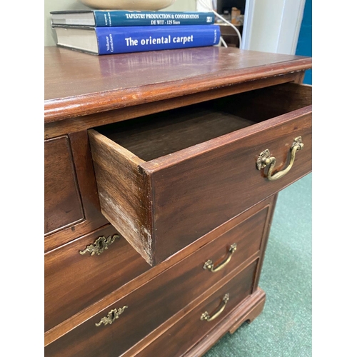 19 - AN ATTRACTIVE NEAT SIZED GEORGIAN MAHOGANY CHEST OF DRAWERS, with molded edge to rectangular top abo... 