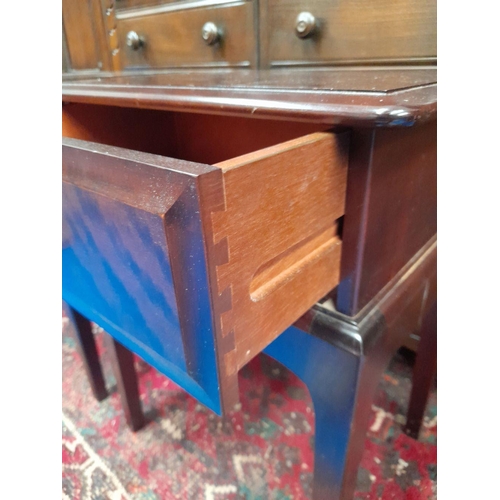 193 - A PAIR OF STAG BEDSIDE LOCKERS / LAMP CABINETS, each with a single drawer and pull ring handle, rais... 