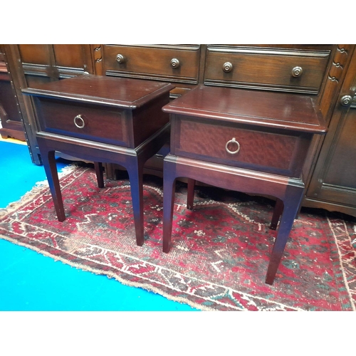 193 - A PAIR OF STAG BEDSIDE LOCKERS / LAMP CABINETS, each with a single drawer and pull ring handle, rais... 