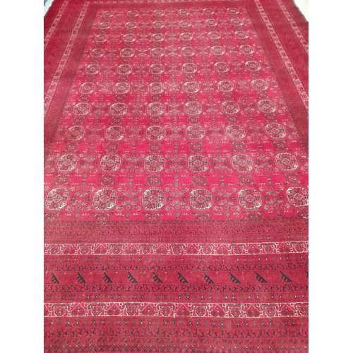 222 - AN EXCELLENT HAND-KNOTTED AFGHAN KUNDUZ RUG, with central repeat geometric pattern surrounded by mul... 