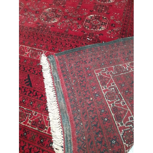 222 - AN EXCELLENT HAND-KNOTTED AFGHAN KUNDUZ RUG, with central repeat geometric pattern surrounded by mul... 