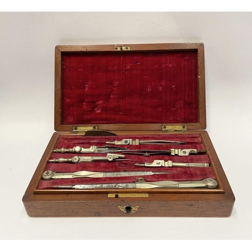 223 - AN ANTIQUE DRAUGHTSMAN’S TECHNICAL DRAWING SET, in fitted mahogany box with geometry tools within to... 