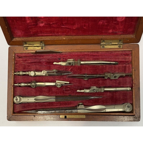 223 - AN ANTIQUE DRAUGHTSMAN’S TECHNICAL DRAWING SET, in fitted mahogany box with geometry tools within to... 