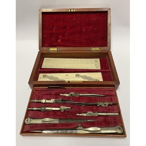 223 - AN ANTIQUE DRAUGHTSMAN’S TECHNICAL DRAWING SET, in fitted mahogany box with geometry tools within to... 