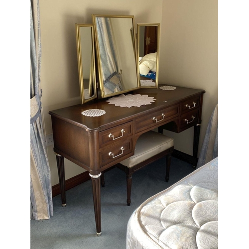 234 - A FINE MAHOGANY FIVE DRAWER VANITY/DRESSING TABLE, with fitted three panel mirror to top, five panel... 