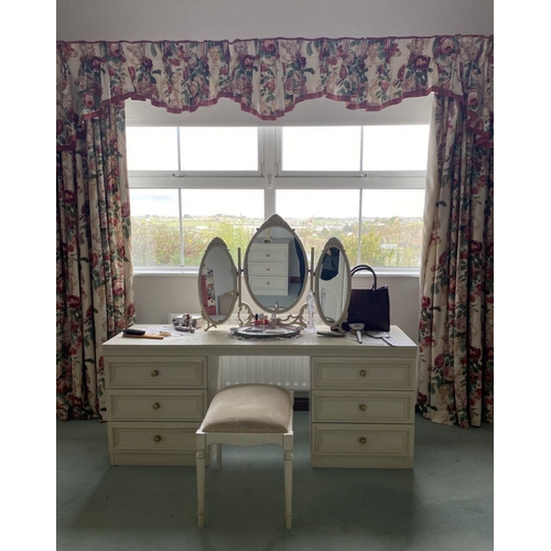 236 - A SIX DRAWER VANITY/DRESSING TABLE, with oval three panelled mirror to top, six panelled drawers to ... 