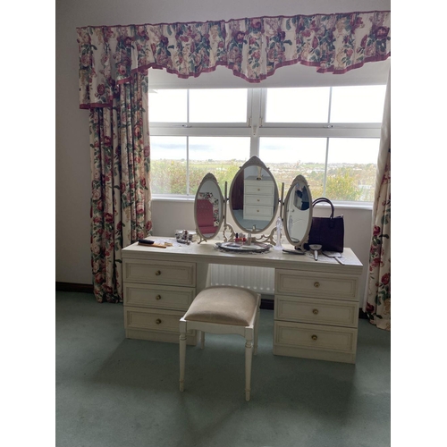 236 - A SIX DRAWER VANITY/DRESSING TABLE, with oval three panelled mirror to top, six panelled drawers to ... 