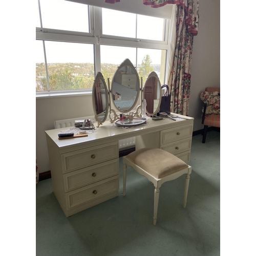 236 - A SIX DRAWER VANITY/DRESSING TABLE, with oval three panelled mirror to top, six panelled drawers to ... 