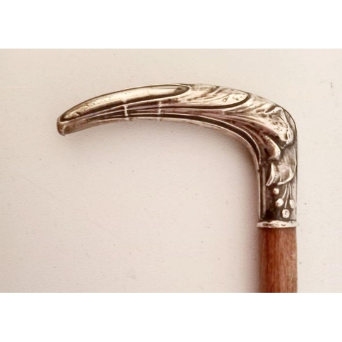 24 - A BEAUTIFUL FRENCH ART NOUVEAU SILVER HANDLED WALKING CANE, with French duty mark to handle. Dimensi... 