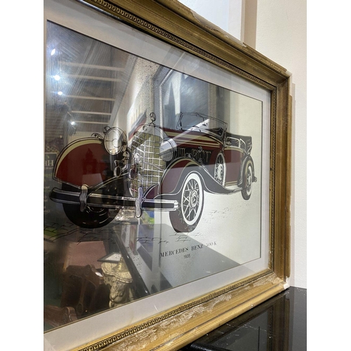 247 - A VINTAGE GILT FRAMED ‘MERCEDES BENZ 500K 1935’ MIRROR, reverse painted mirror in carved gilt frame.... 