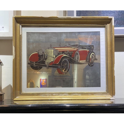 247 - A VINTAGE GILT FRAMED ‘MERCEDES BENZ 500K 1935’ MIRROR, reverse painted mirror in carved gilt frame.... 