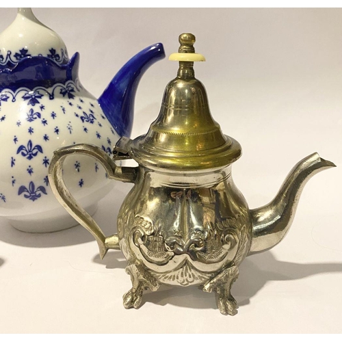 257 - A COLLECTION OF VINTAGE TEAPOTS, to include (i) a decorative possibly silver teapot with bone finial... 