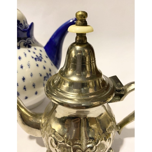 257 - A COLLECTION OF VINTAGE TEAPOTS, to include (i) a decorative possibly silver teapot with bone finial... 