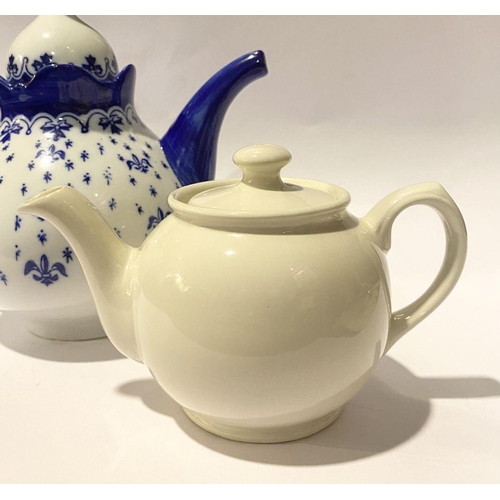 257 - A COLLECTION OF VINTAGE TEAPOTS, to include (i) a decorative possibly silver teapot with bone finial... 