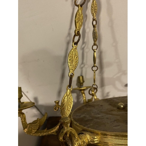 263 - A DECORATIVE SIX BRANCH GILT CHANDELIER, with floral finial to top, leaf design to chains supporting... 