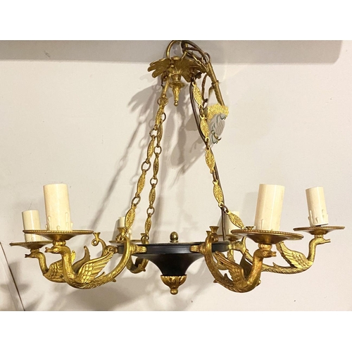 265 - A DECORATIVE SIX BRANCH GILT CHANDELIER, with floral finial to top, leaf design to chains supporting... 