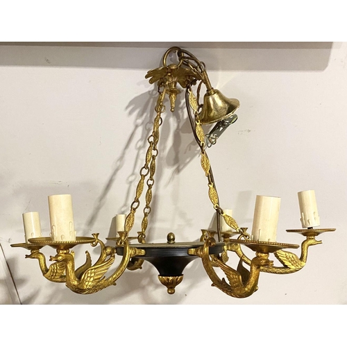 265 - A DECORATIVE SIX BRANCH GILT CHANDELIER, with floral finial to top, leaf design to chains supporting... 