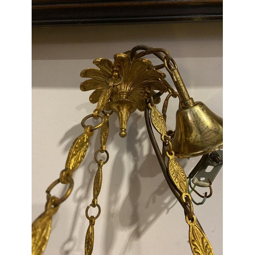 265 - A DECORATIVE SIX BRANCH GILT CHANDELIER, with floral finial to top, leaf design to chains supporting... 