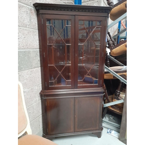 266 - A 20TH CENTURY GOOD QUALITY WIDE ASTRAGAL GLAZED CORNER CABINET, with decorative gadrooned detail to... 