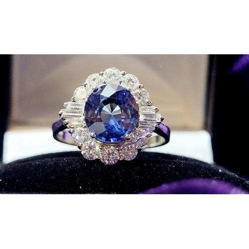 4 - AN 18CT WHITE GOLD ART DECO STYLE SAPPHIRE & DIAMOND CLUSTER RING, with round brilliant cut diamonds... 