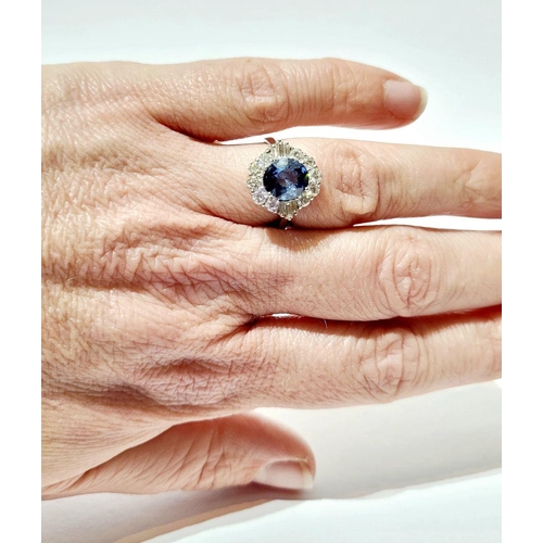 4 - AN 18CT WHITE GOLD ART DECO STYLE SAPPHIRE & DIAMOND CLUSTER RING, with round brilliant cut diamonds... 