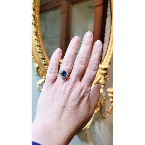 4 - AN 18CT WHITE GOLD ART DECO STYLE SAPPHIRE & DIAMOND CLUSTER RING, with round brilliant cut diamonds... 