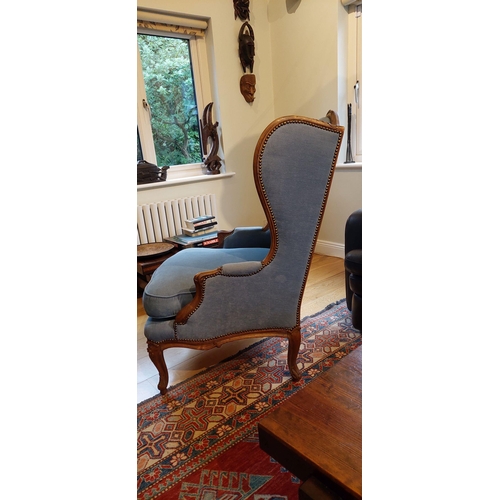 46 - A VERY GOOD QUALITY FRENCH QUEEN ANNE STYLE WING BACKED ARMCHAIR, nicely upholstered, with bead deta... 