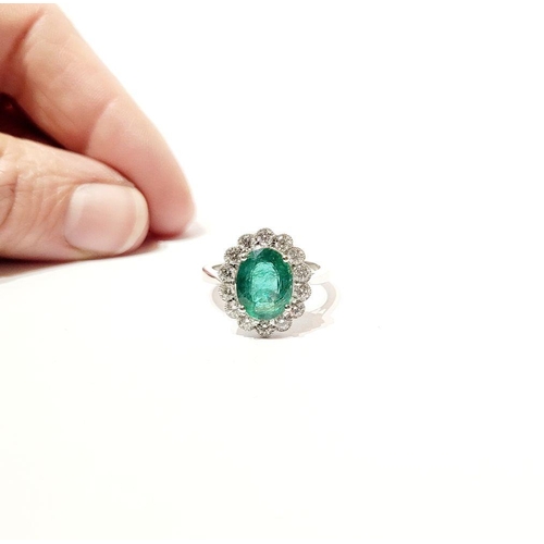 6 - AN 18CT WHITE GOLD EMERALD & DIAMOND RING, with 4.70ct of Emerald, the diamonds in a milligrain sett... 