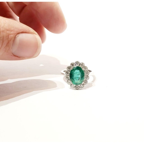 6 - AN 18CT WHITE GOLD EMERALD & DIAMOND RING, with 4.70ct of Emerald, the diamonds in a milligrain sett... 