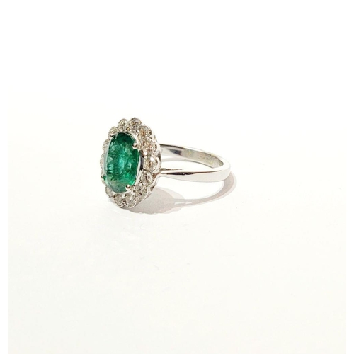 6 - AN 18CT WHITE GOLD EMERALD & DIAMOND RING, with 4.70ct of Emerald, the diamonds in a milligrain sett... 