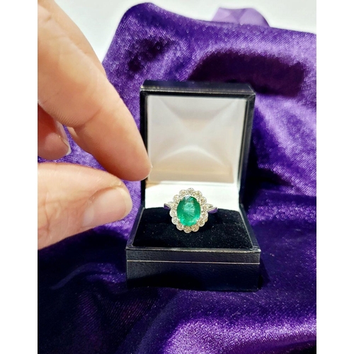 6 - AN 18CT WHITE GOLD EMERALD & DIAMOND RING, with 4.70ct of Emerald, the diamonds in a milligrain sett... 