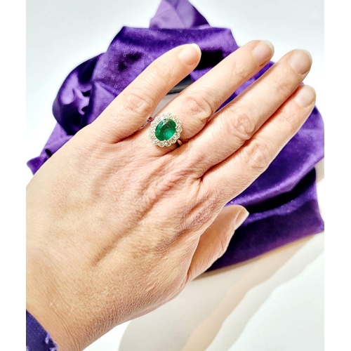 6 - AN 18CT WHITE GOLD EMERALD & DIAMOND RING, with 4.70ct of Emerald, the diamonds in a milligrain sett... 