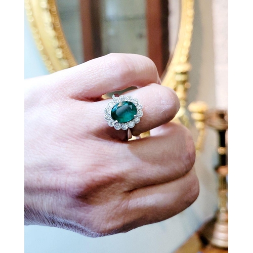 6 - AN 18CT WHITE GOLD EMERALD & DIAMOND RING, with 4.70ct of Emerald, the diamonds in a milligrain sett... 