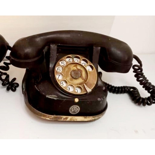 64 - TWO VINTAGE TELEPHONES: both rotary phones, one an FTR phone with carry handle. Lovely decorative vi... 